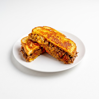Grilled Cheese Birria Sandwich and Consome Combo
